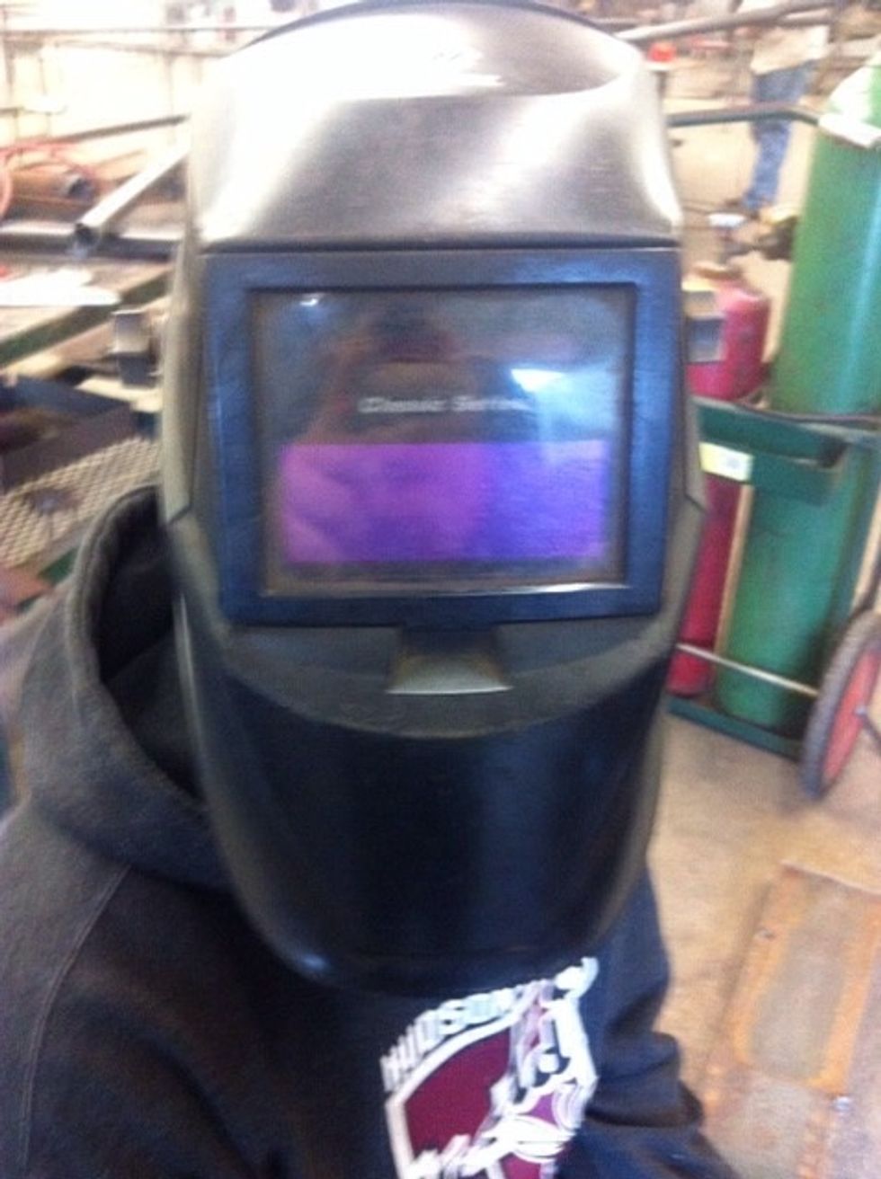 Put on your welding hood, and make sure it is turned on if it isn't automatic.