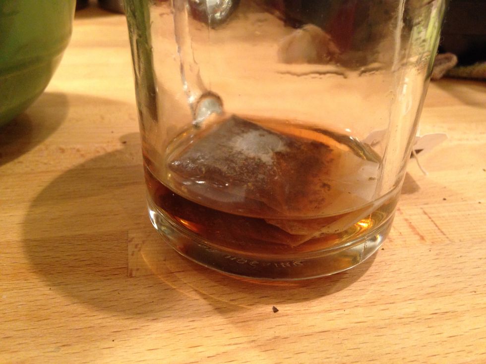 Put one bag of tea in a cup with 1/4 cup of bowling water. Let steep for 5 minutes.