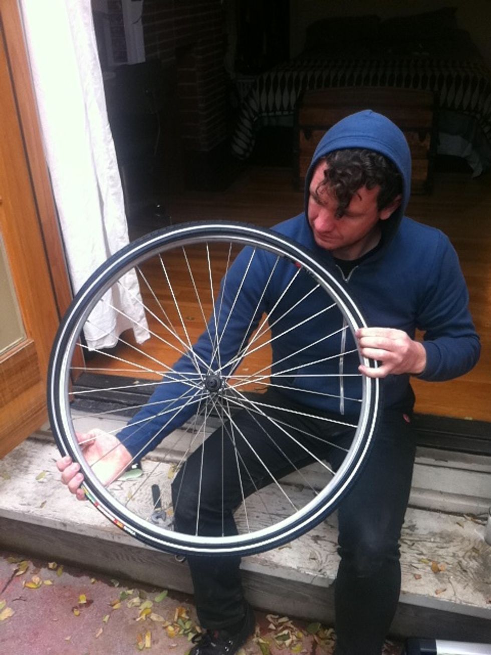 put one bead of the tire in the rim all the way around