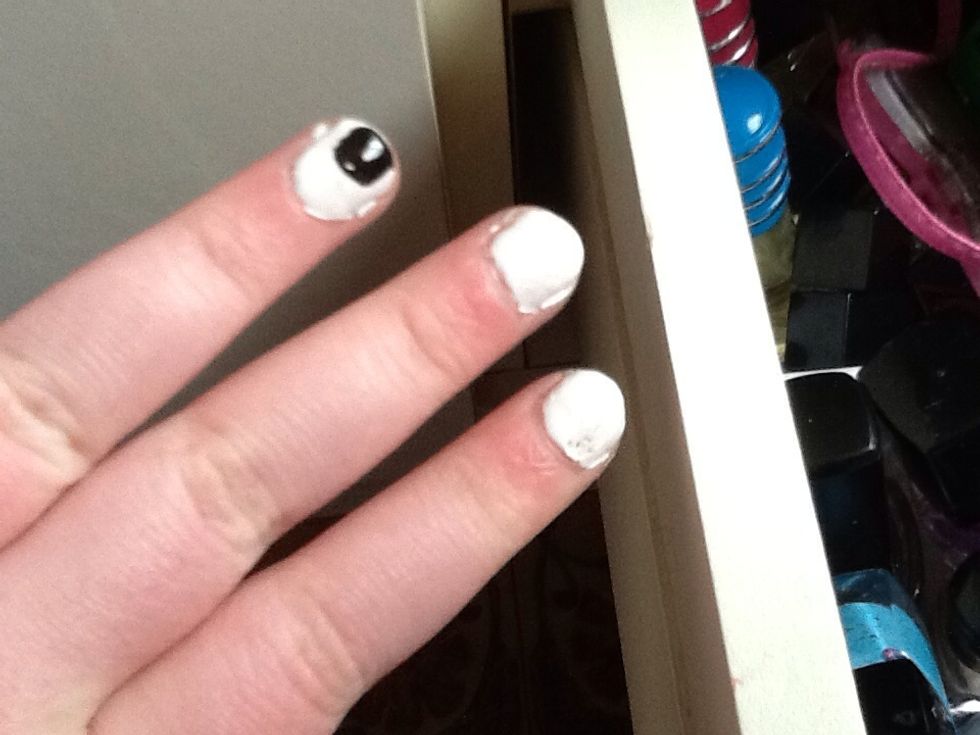 Put one black dot on bottom of feature nail and...