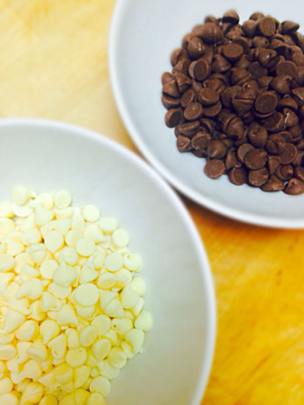 Put one cup milk chocolate chips in one bowl and cup white chocolate chips in another