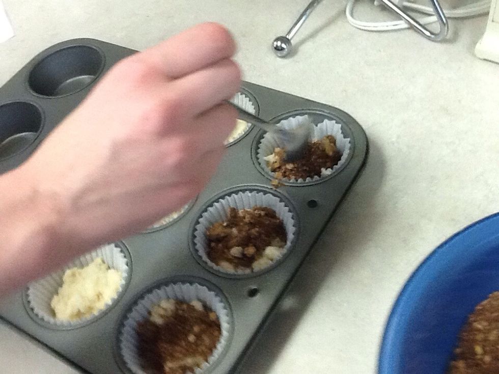 Put one layer of muffin batter in first then put a layer of the spicy topping on it.