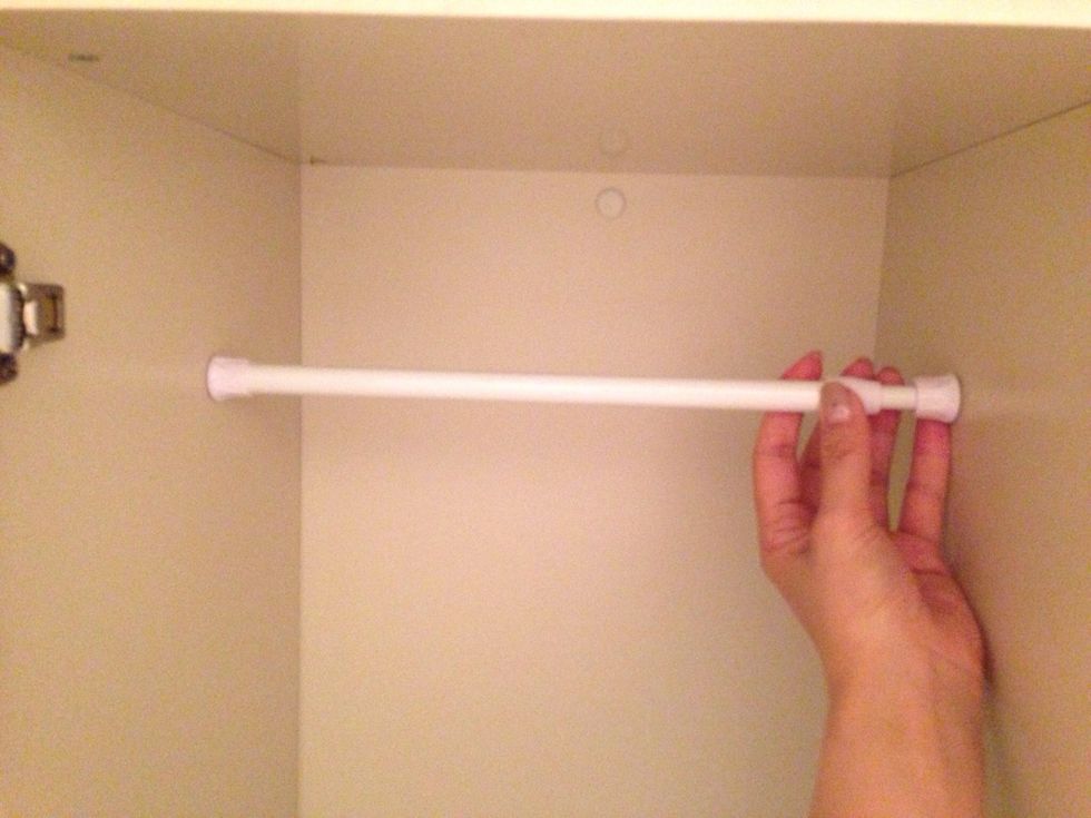 Put one rod 10 cm(4 inches) from the ceiling and the back.