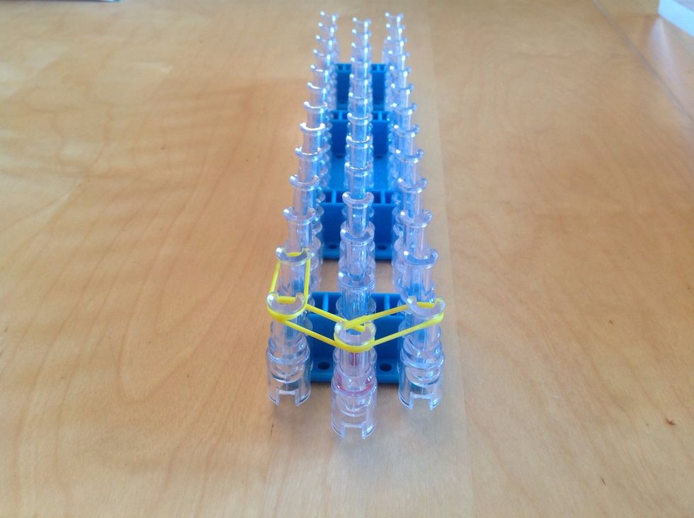 Put one up the left side and do it until you reach the end of the loom. Then do the same on the other side.