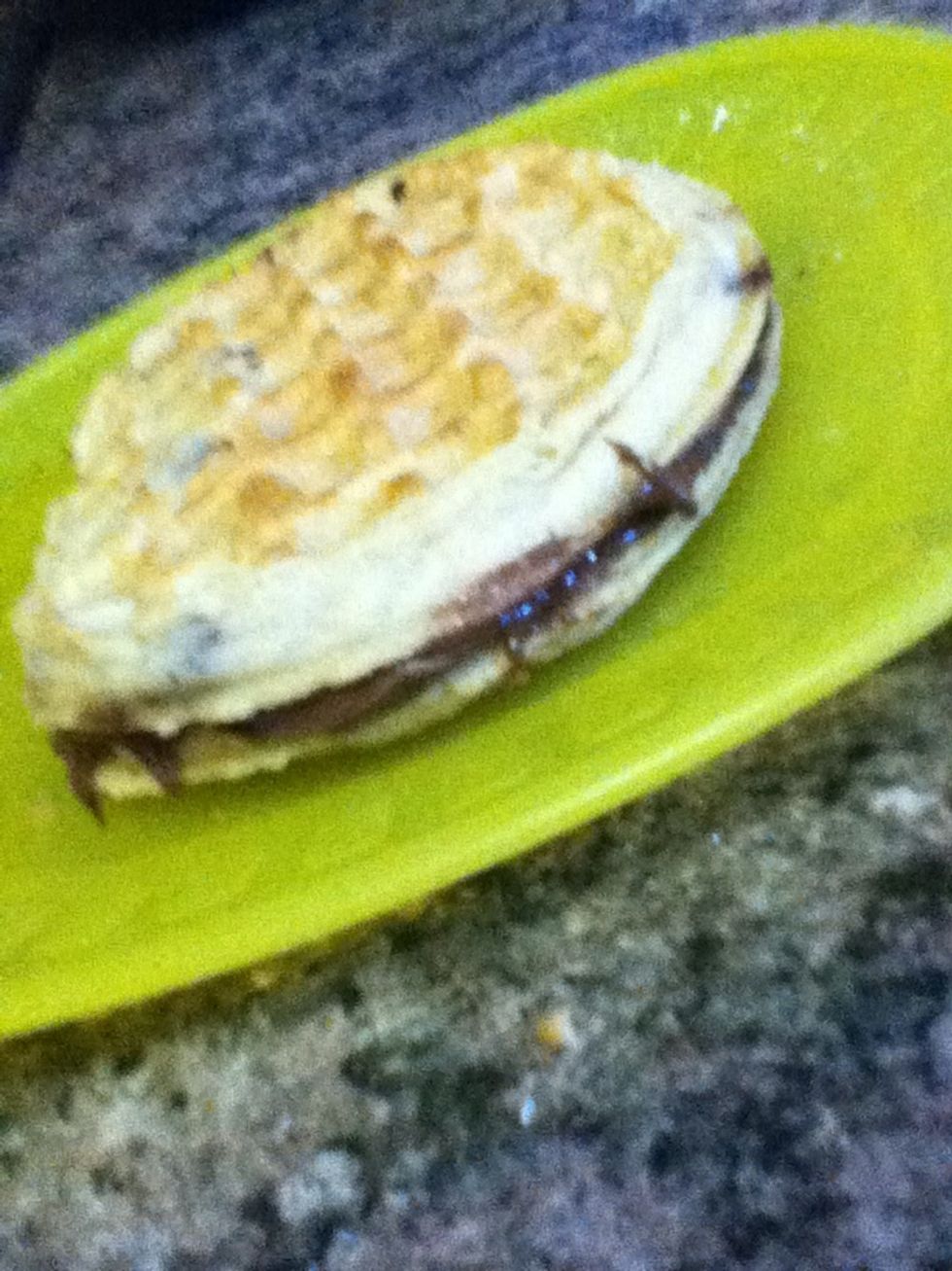 Put one waffle on top of the other like a sandwich.