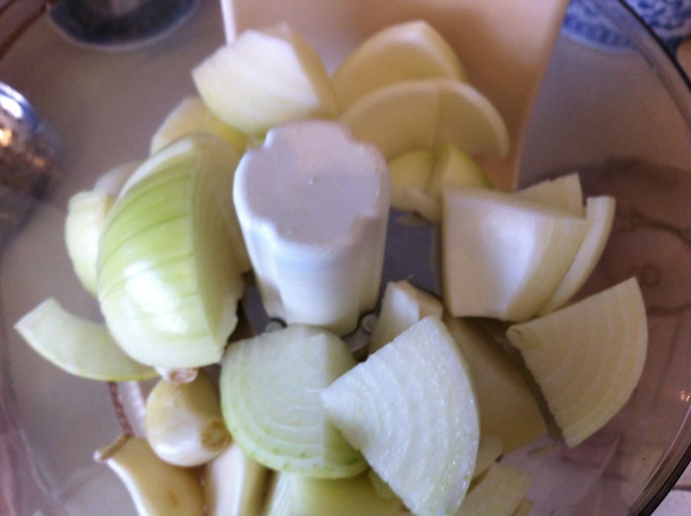 Put onion and garlic in blender