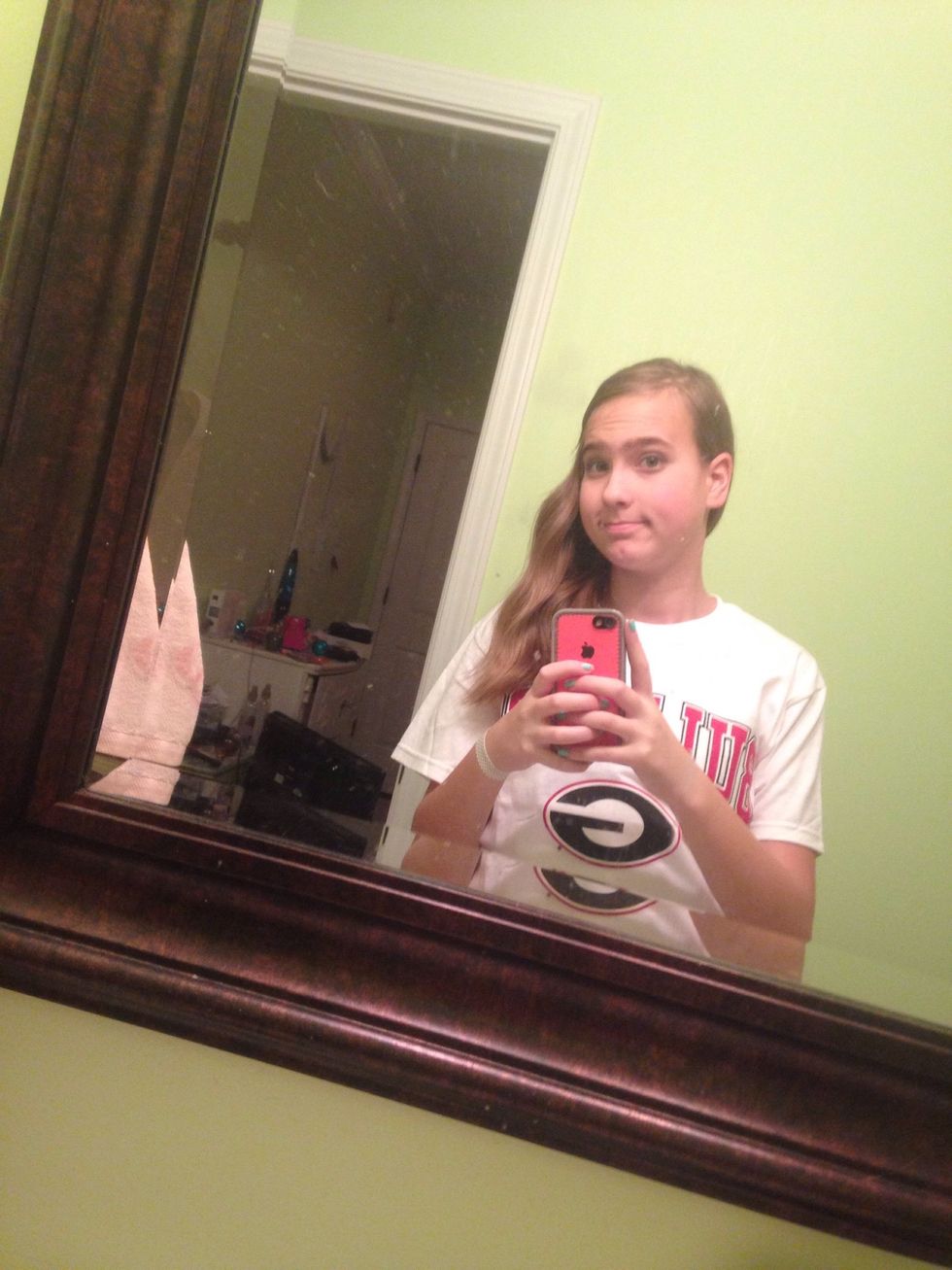 Put opposite side behind ear and bring all your hair to the side with the Bobby pin