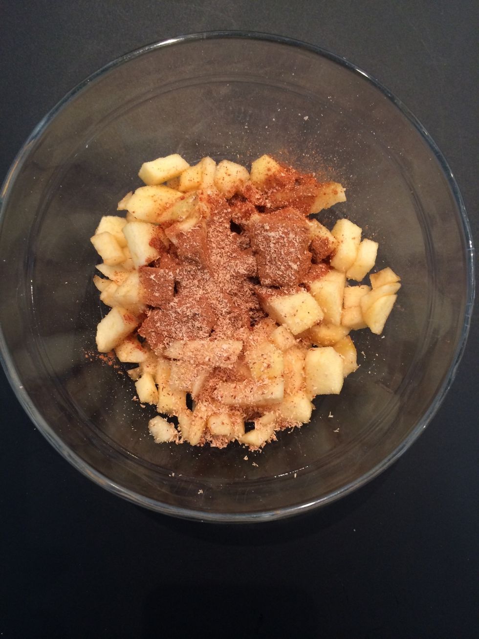 Put  Over the apples 1 Tsp cinnamon and little nutmeg.