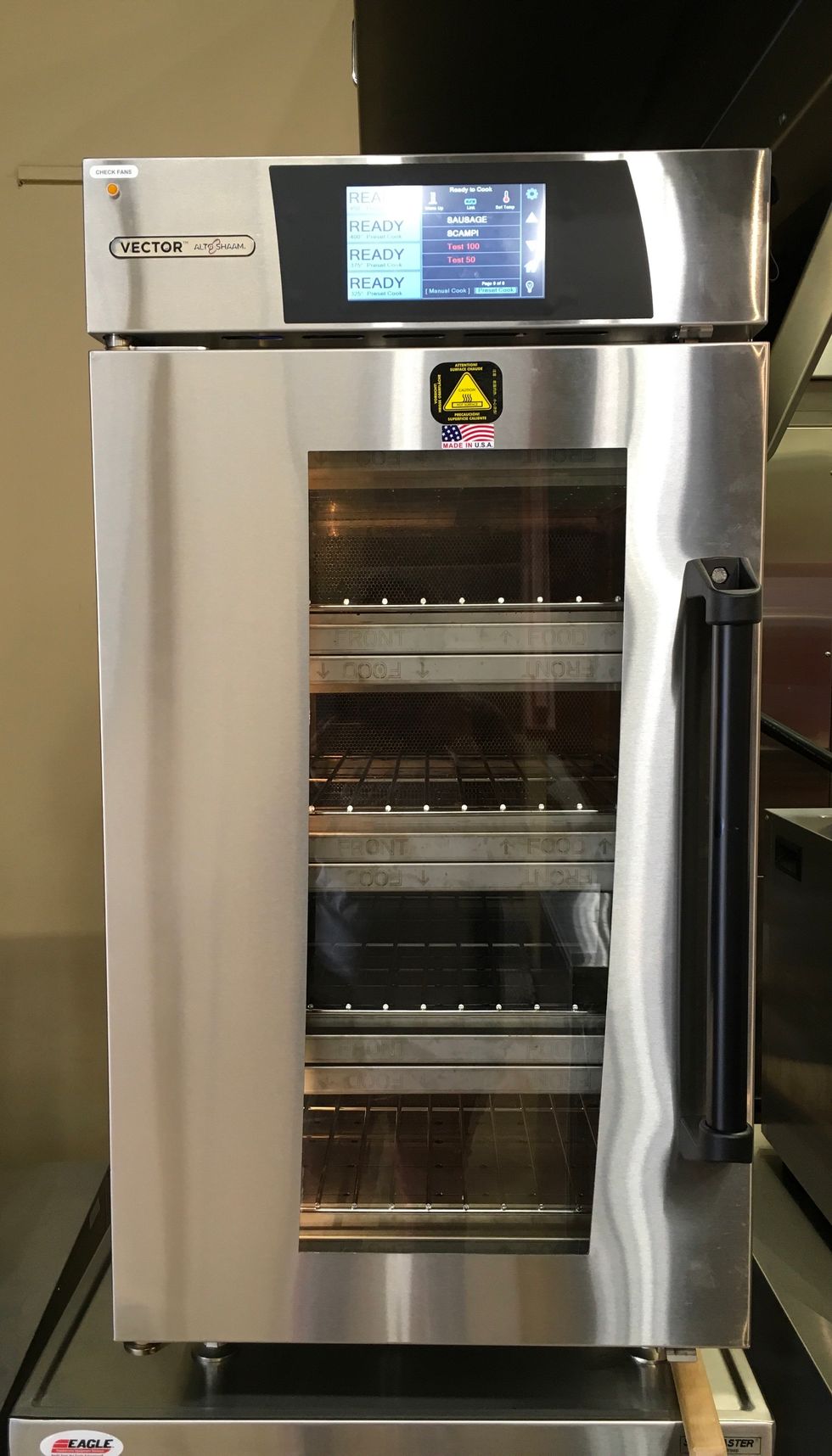 Put pan in Vector oven. Cook at 450 Degrees, 80% fan Speed for 3 minutes and 45 seconds.