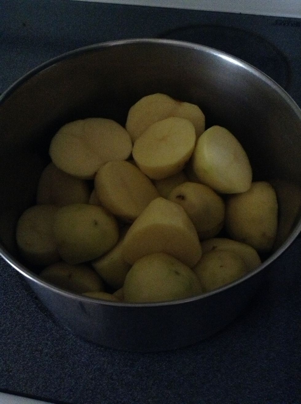 Put peeled, sliced potatoes in a pot