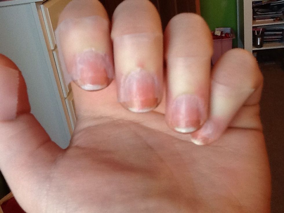 Put pieces of tape on your whole nail except for the area where you want the French tips.