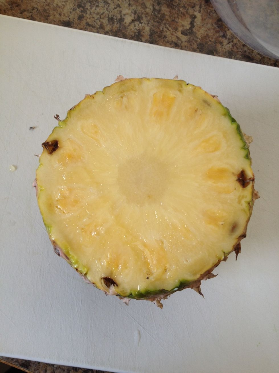 Put pineapple with one cut side down