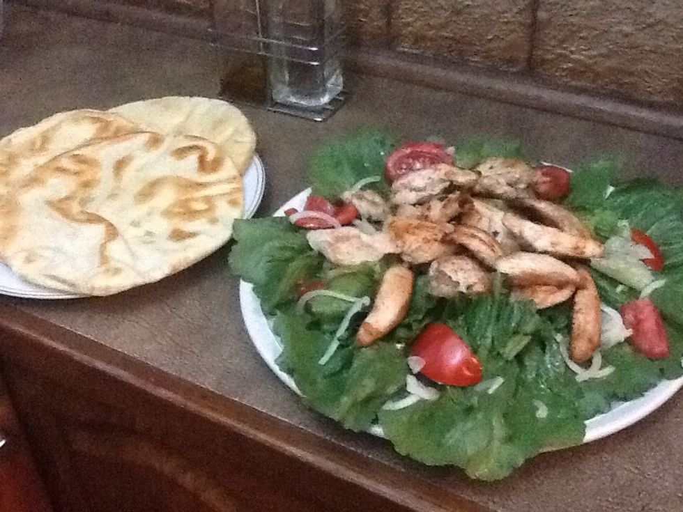 Put pita bread on serving plate after extra oil is absorbed ready to break into pieces with your chicken salad or you can roll up your chicken salad in the pita bread.
