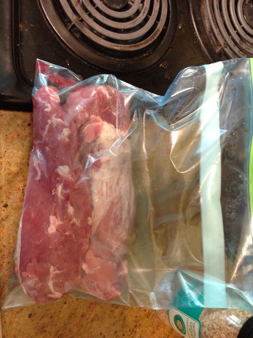 Put pork tenderloin into a freezer bag.