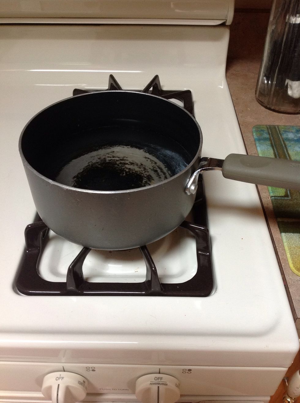 Put pot on the burner.