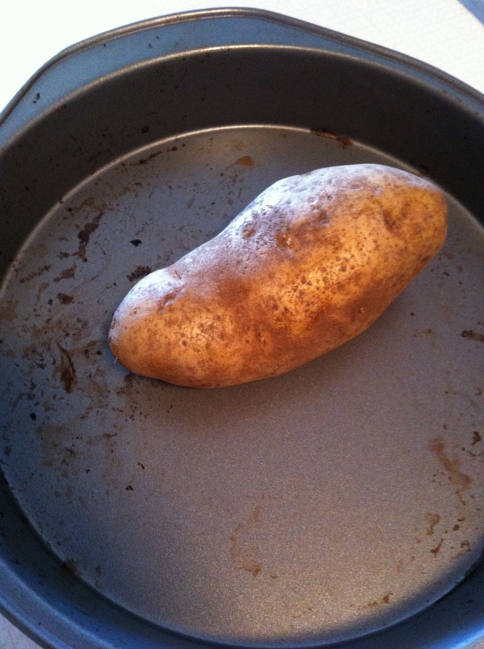 Put potatoes in baking sheet