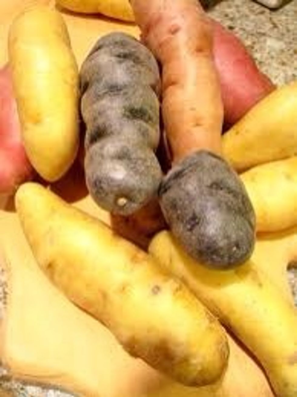 put potatoes in plastic bag. Put a couple of glugs of oil in. Add salt and pepper chopped rosemary and crushed garlic.Shake them in the bag, then place on a baking sheet.put in oven at 350 degrees.