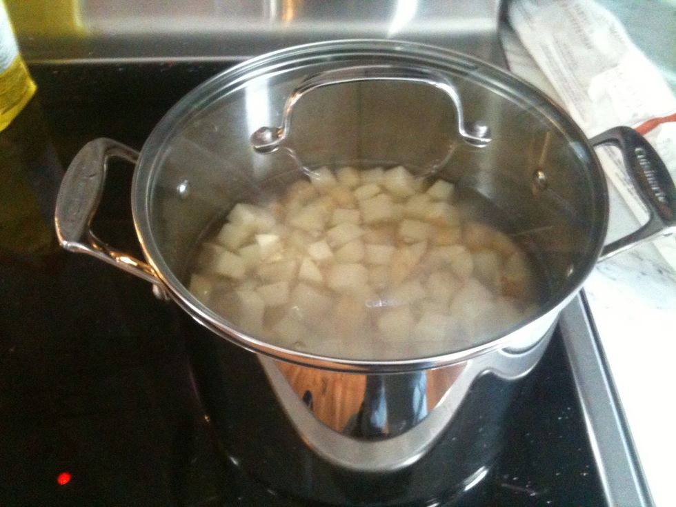 Put potatoes in pot and fill with water. Enough water to cover potatoes.
