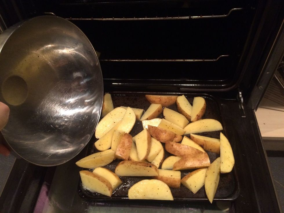Put potatoes on hot tray in oven
