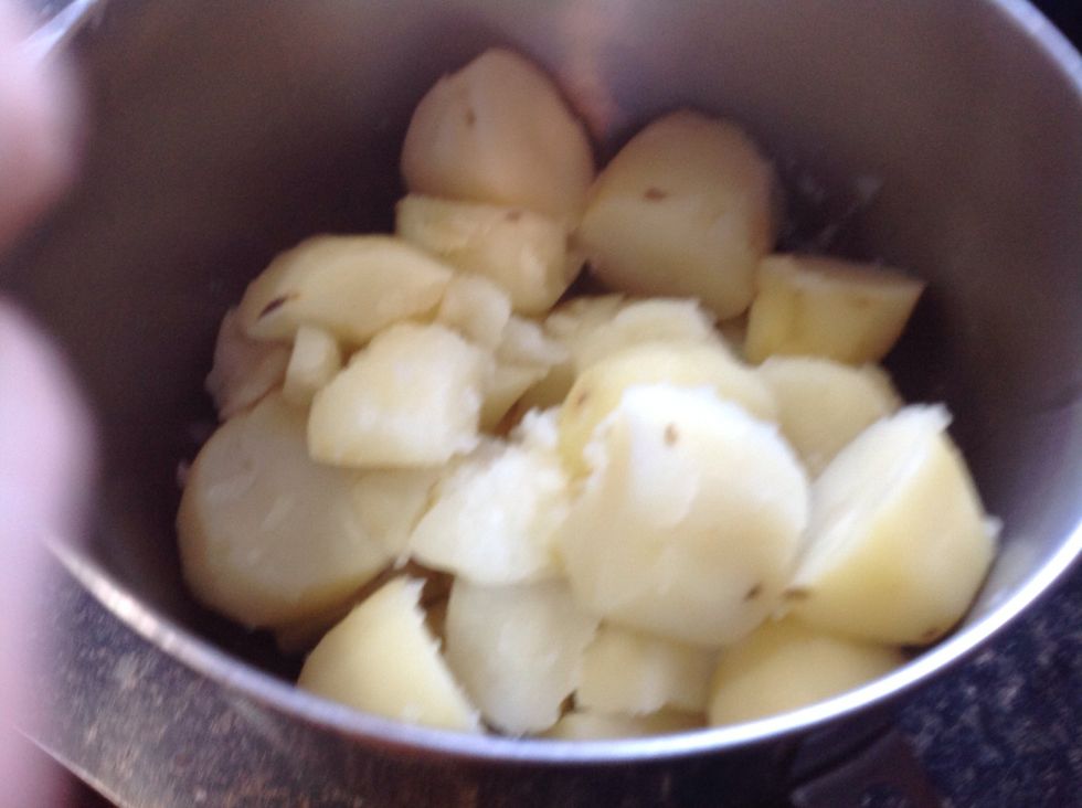 Put potatoes on top of the butter