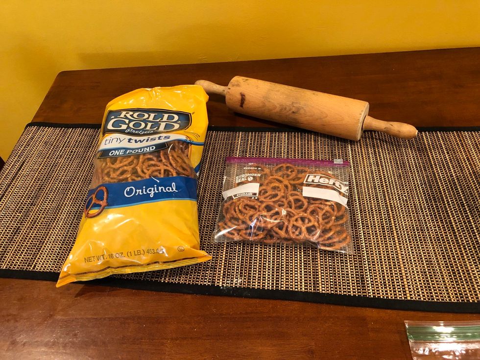 Put pretzels in bag and crush