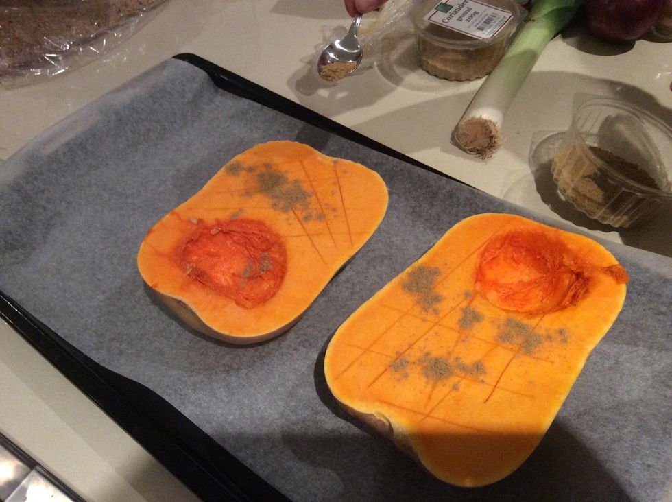 Put Pumpkin into a roasting tray and add the Cumin and Coriander