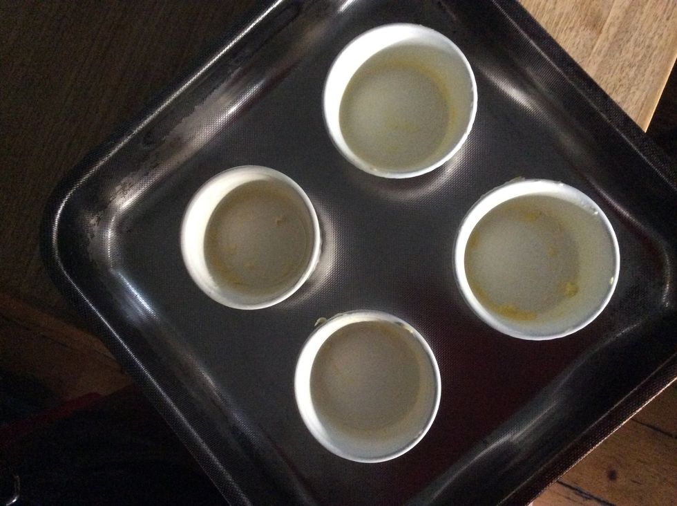 Put ramekins into a cooking tray