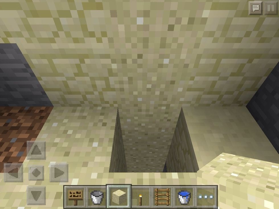 Put regular sand blocks on top of the torch