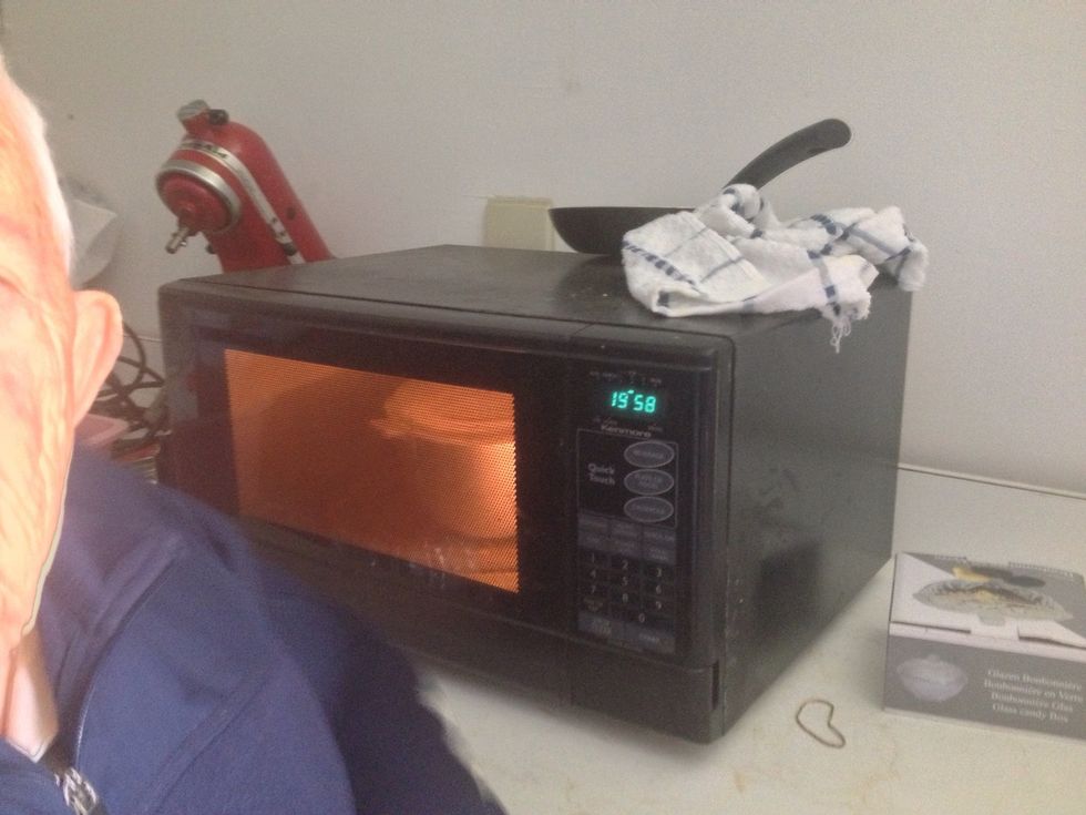 Put rice in microwave for 20 minutes. Afterwards, let sit until water soaks into rice completely.