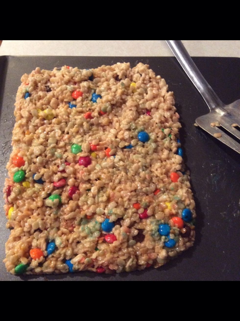 Put rice krispie treat on the trey and make it flat