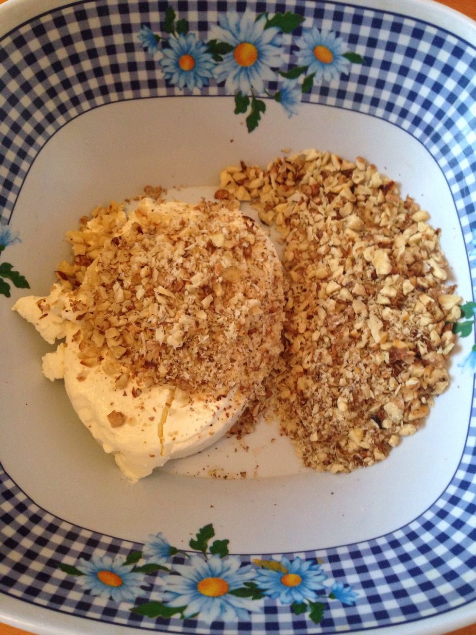 Put room temp cream cheese in a bowl. Add walnuts.