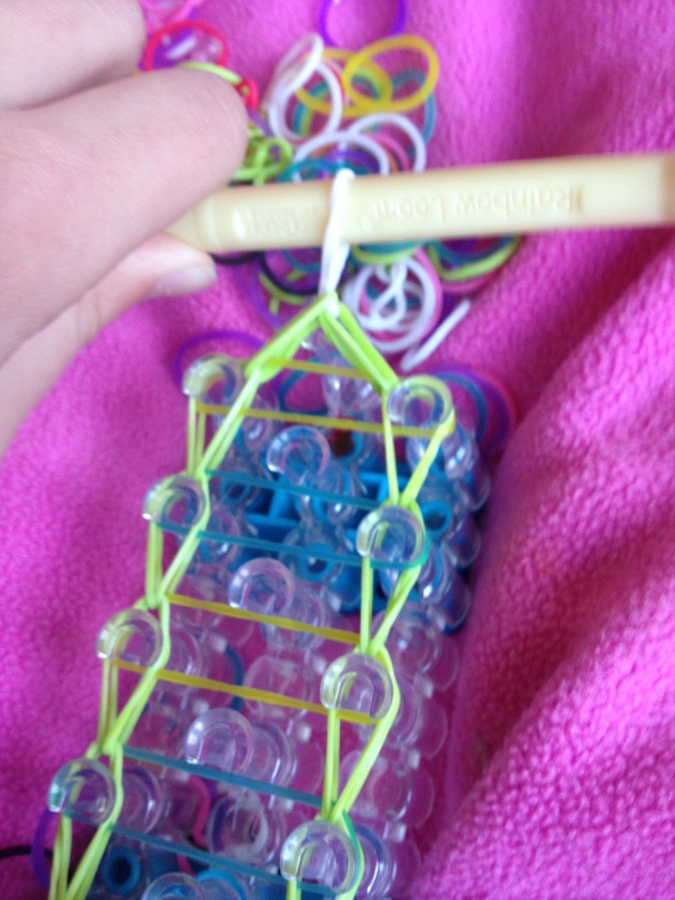 Put rubber band on hook as so\u2026