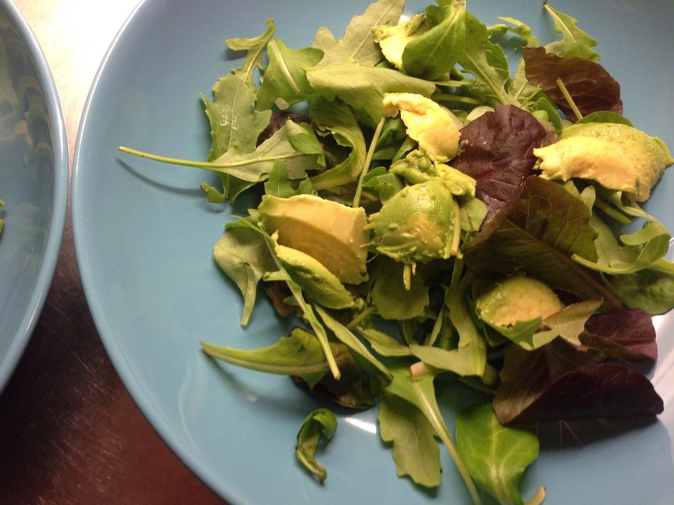 Put salad on your plate. Add diced avocado.