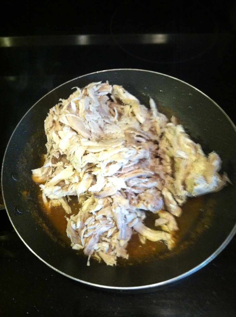 Put shredded chicken in pan.