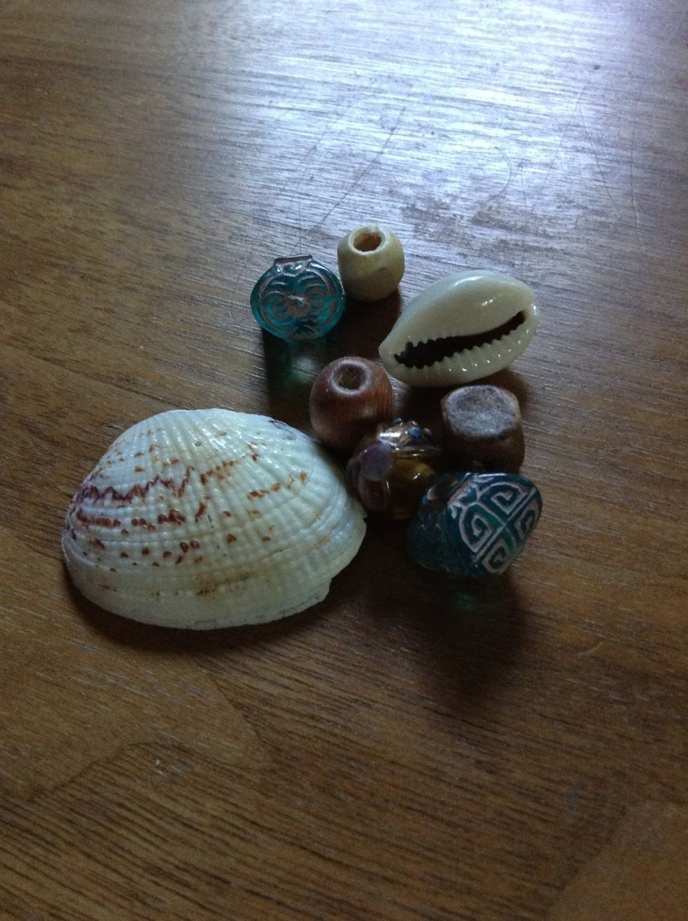 && put some beads in to help hide gnarly parts of dreads ! also beads & shells are beautiful c :