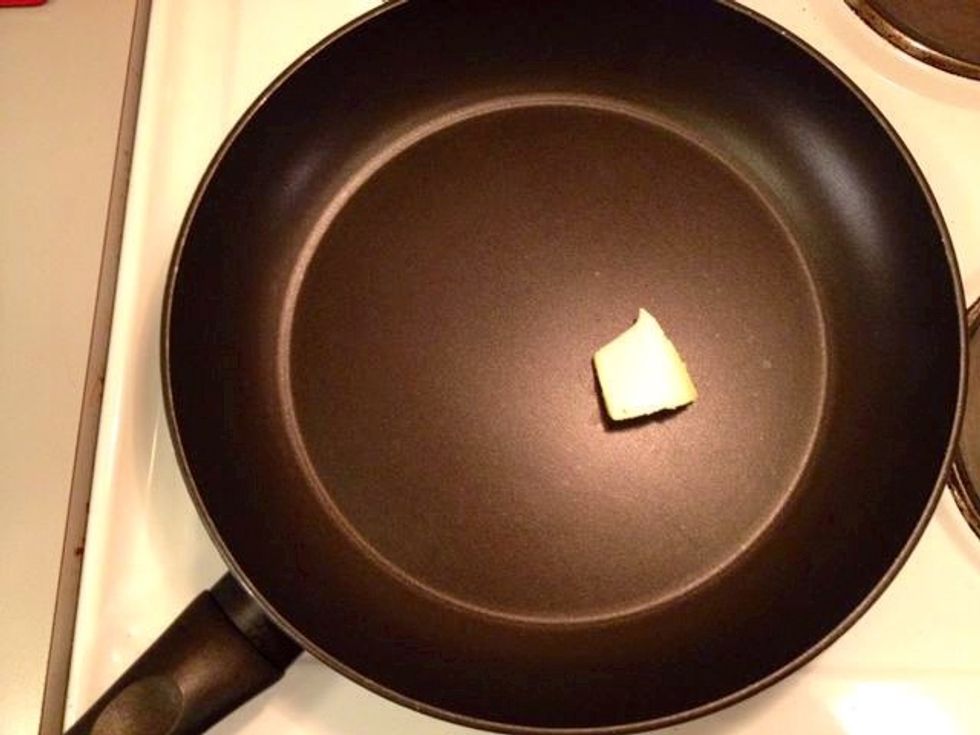 Put some butter in a frying pan.