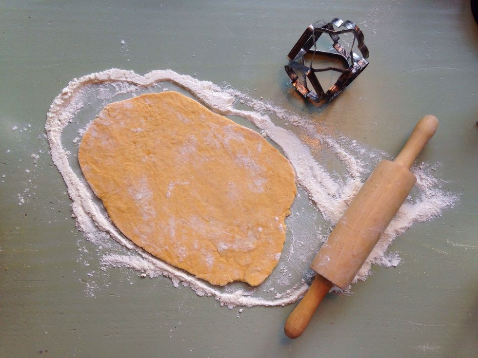 Put some flour on top of it and start rolling! You can make it as thick or thin as you like. Mine was about 0.5 cm. Then, pick a cookie cutter!