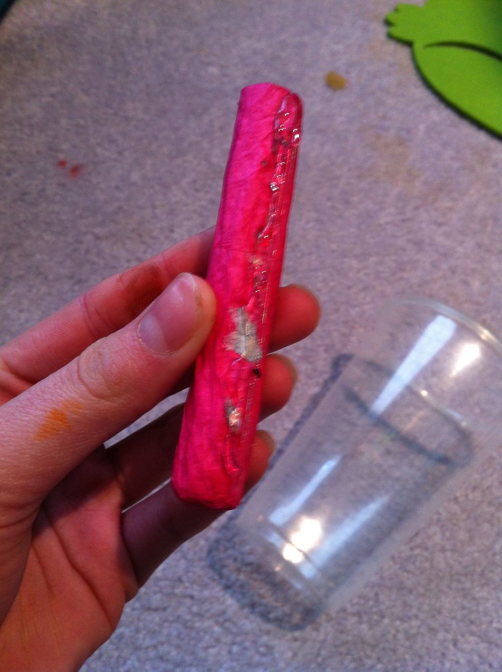 Put some hot glue in a line all along one side of the tubes