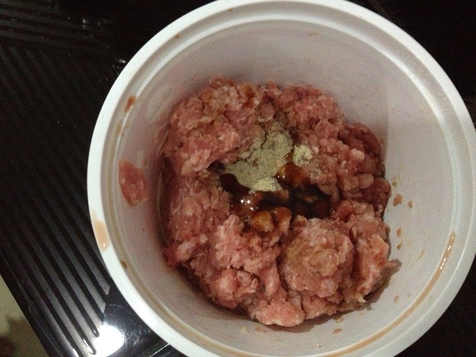 Put some of soy sauce and pepper in the pork and wait for 15 mins
