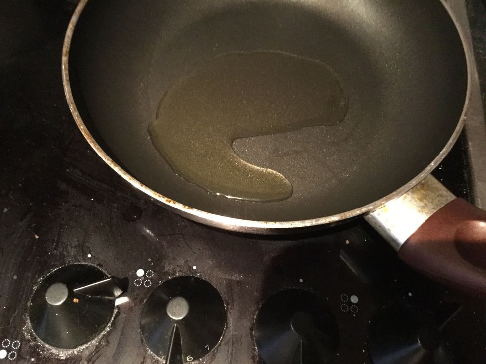 Put some oil in a heated up pan and add onions and garlic