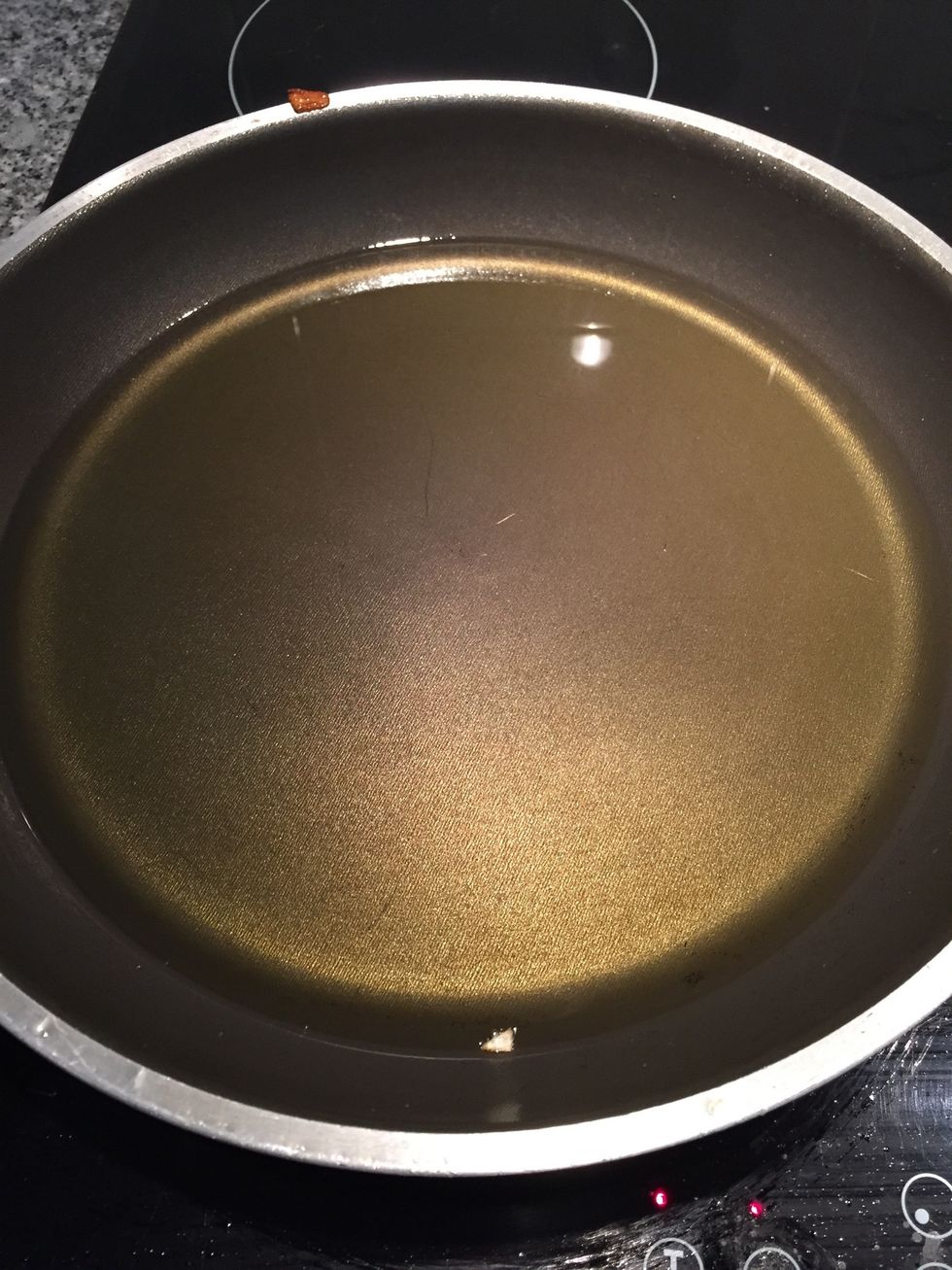 Put some olive oil in a pan and heat it