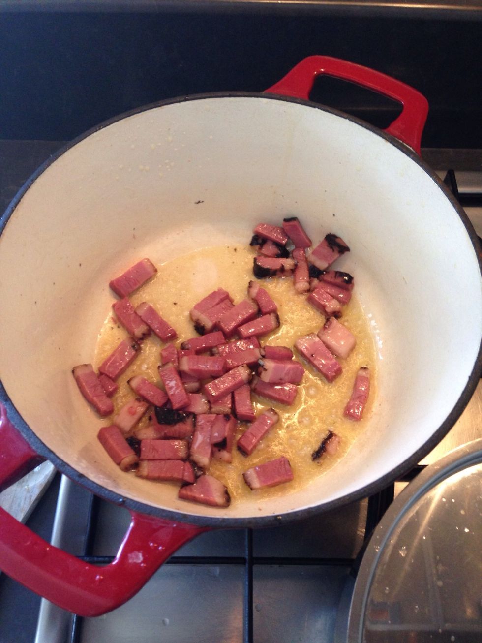 Put some olive oil in the casserole and add in the bacon chopped in to small sticks. (I used goose breast because my family doesn't eat pork)