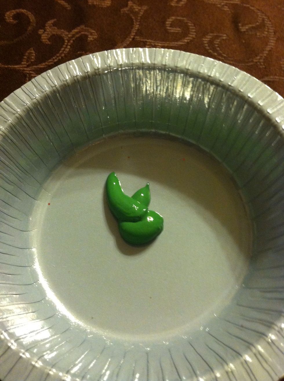 Put some paint on a plate a little goes a long way, u don't need much. Get your brush and paint the toothpick. I don't paint it all the way.