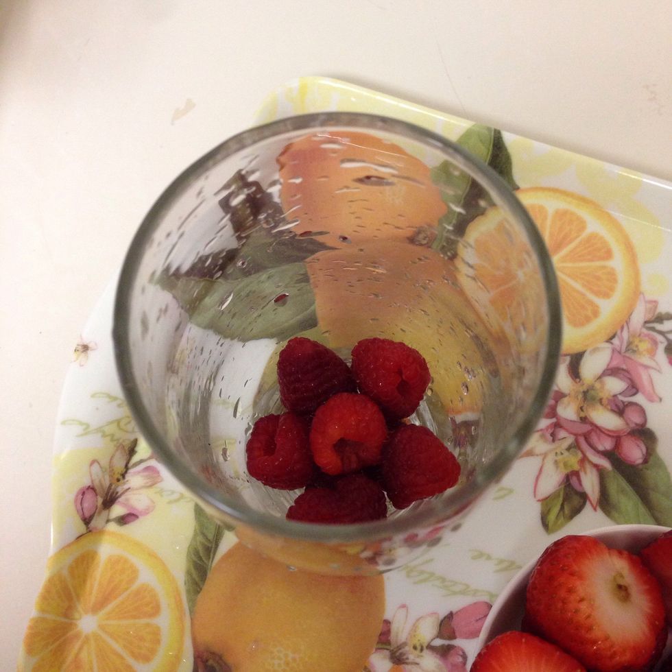 Put some raspberries in the cup