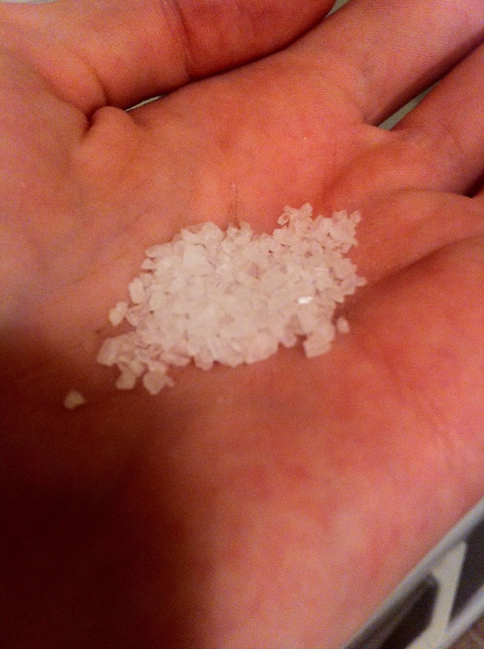 Put some sea salt in the palm of your hand and add a pinch of it into the mug.