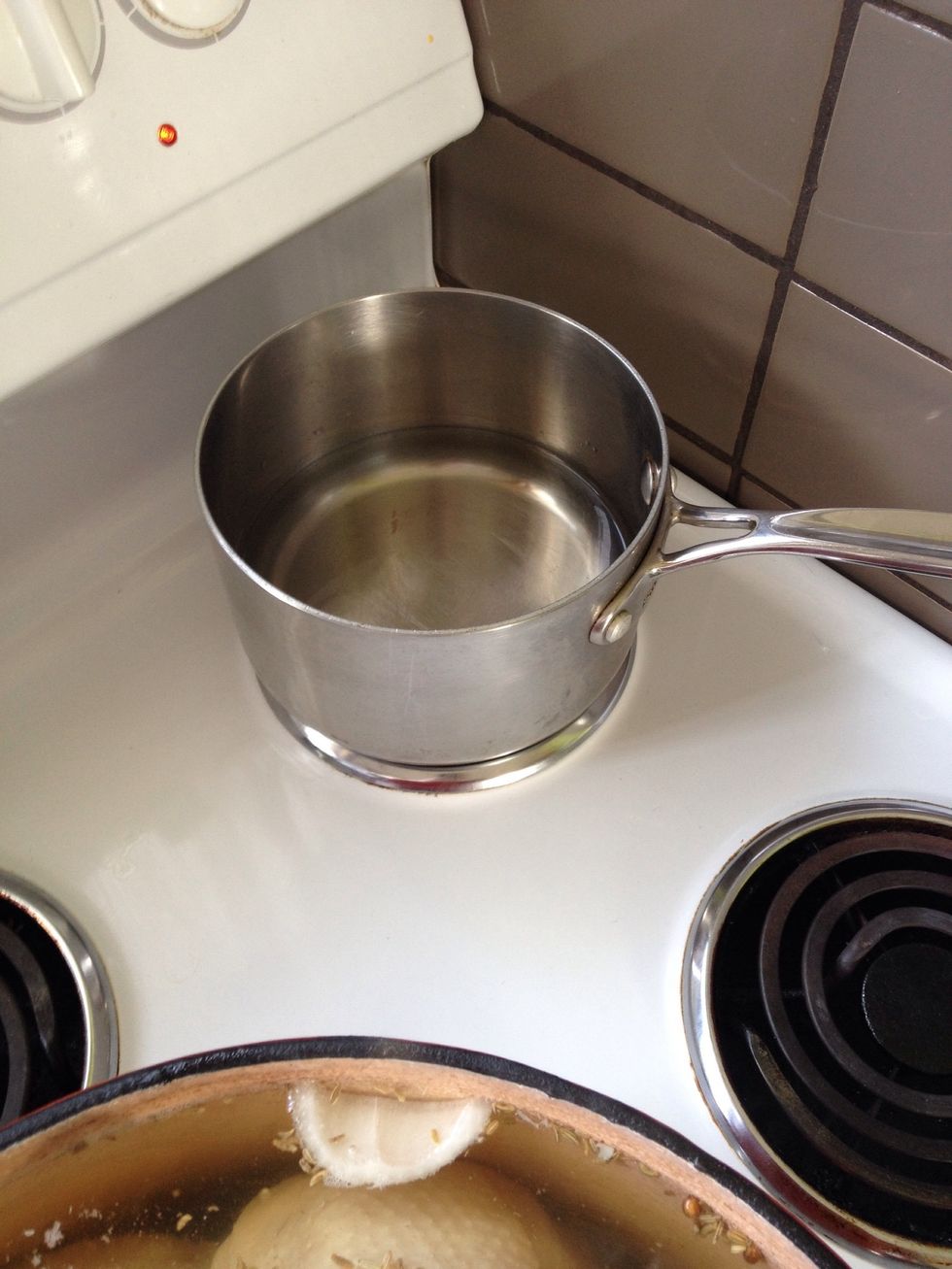 Put some water on the stove to heat