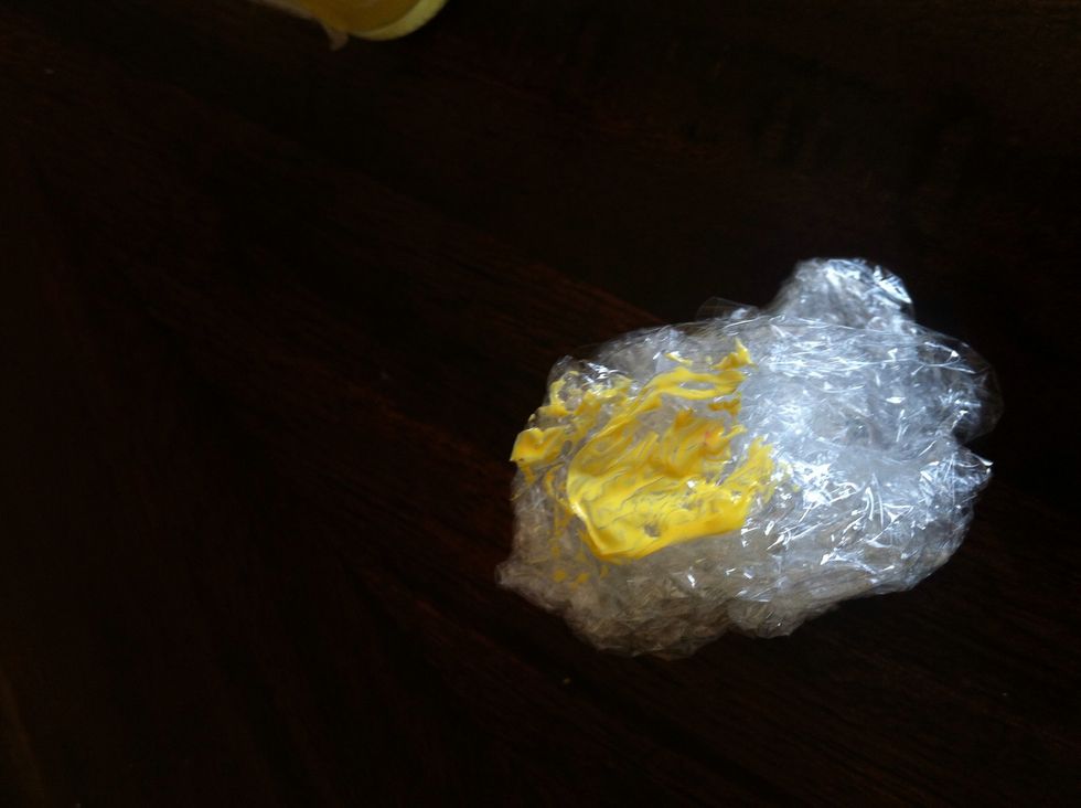 Put some yellow nail polish on your Saran wrap....