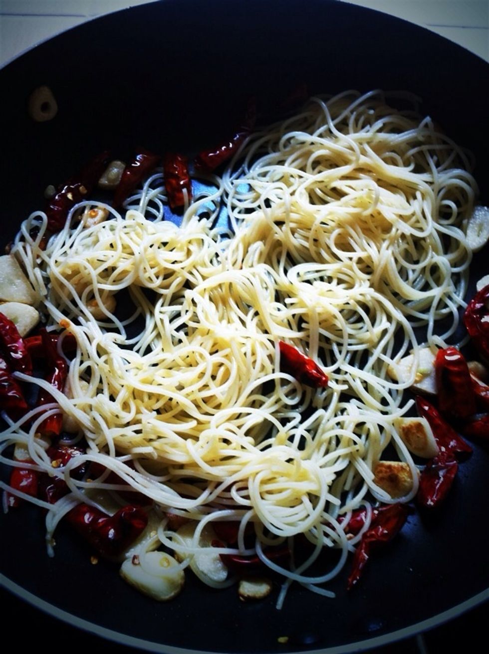 Put spaghetti mix it together. And don't forget black pepper, salt, and sugar.