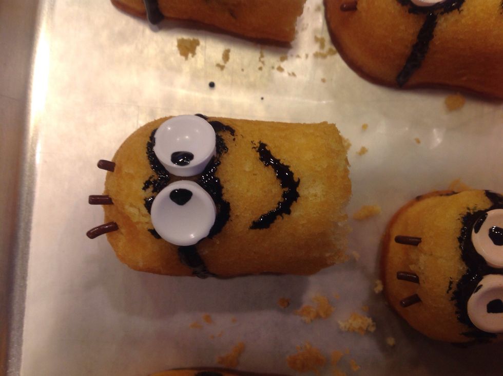 Put sprinkles on top of the cake cloud for hair