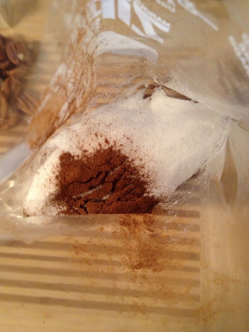 Put sugar and cinnamon in a gallon bag